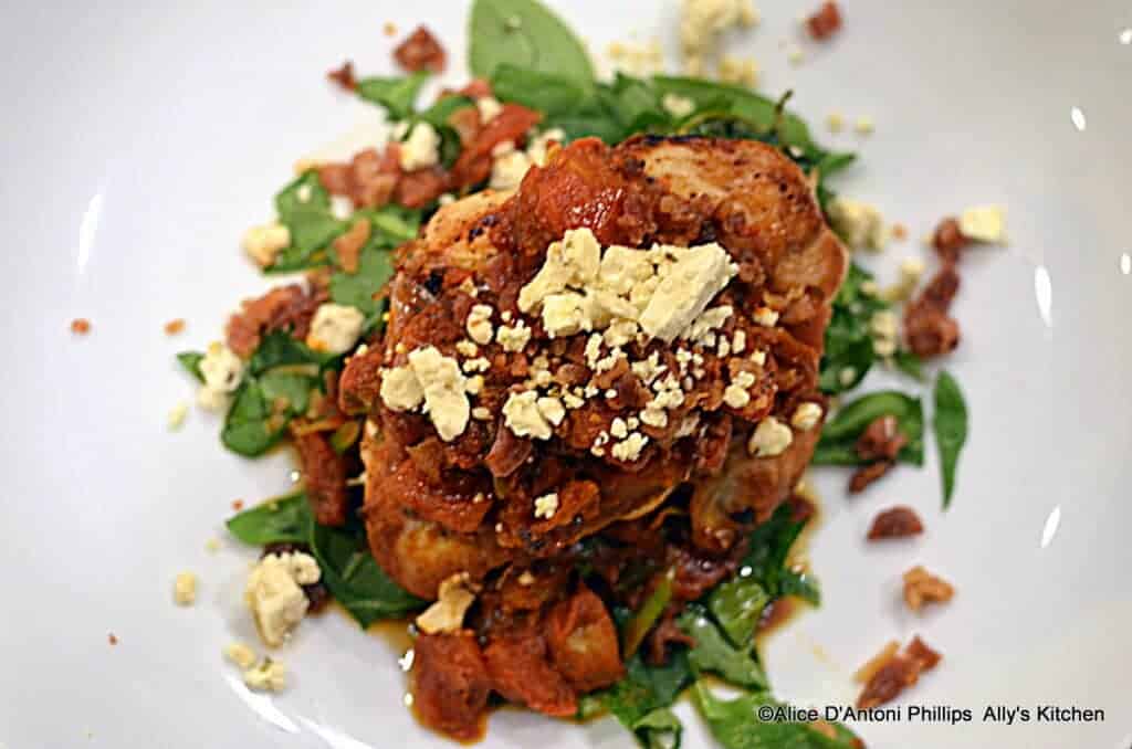 ~tomato pesto spinach stuffed grilled chicken with chunky sauce & crumbled lemon herb feta~