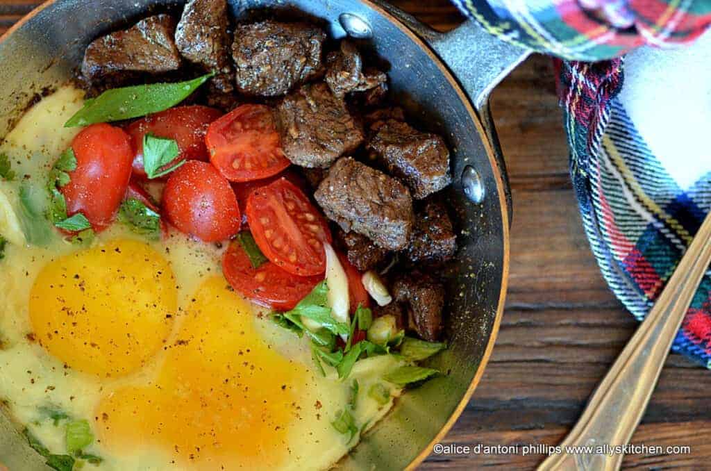 moroccan beef ribeye bites with steamed eggs tomatoes & green onions