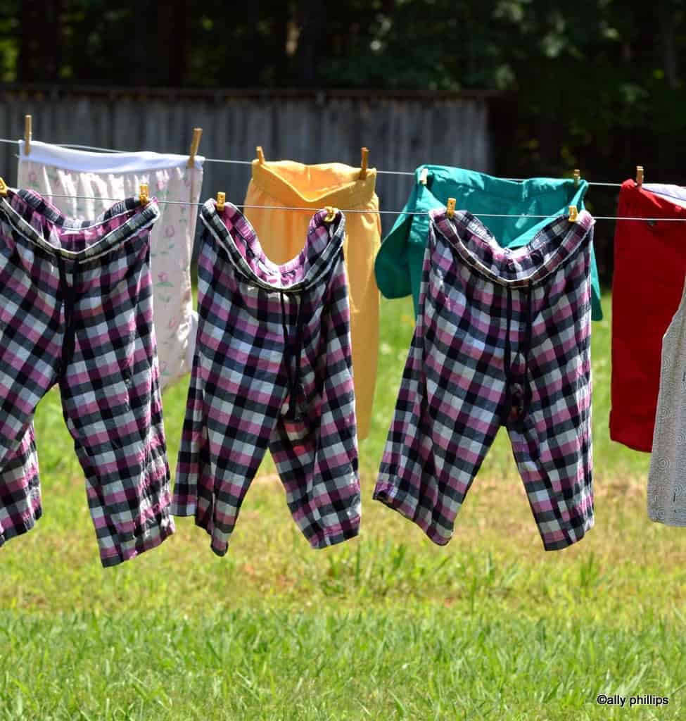 Checkered pants hanging from a clothesline