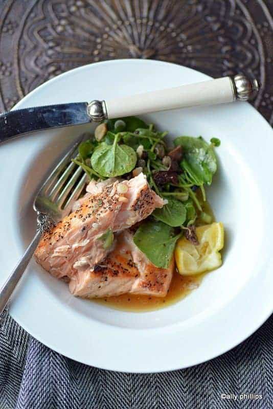 salmon with watercress scallion caper vinaigrette topping