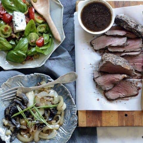 pepper encrusted bison tenderloin & grilled onions