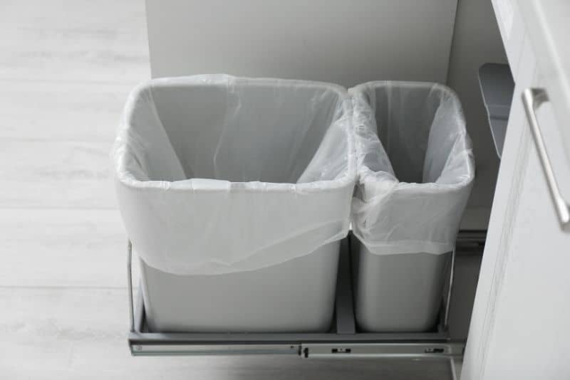 Where do you keep your kitchen garbage receptacle?